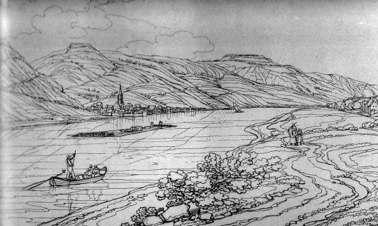 Foto "Ansicht der Stadt Lorch mit einem vorbeifahrenden Floß."